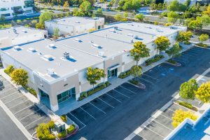 aerial-view-of-industrial-commerce-office-building-2022-10-17-01-15-14-utc1