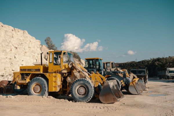 Heavy machinery in quarry. Building materials mining